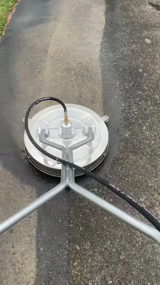 Surface cleaner taking grime off concrete edge