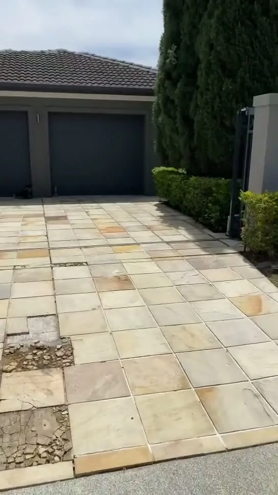 Sandstone driveway cleaned by Quacky's Pressure Washing