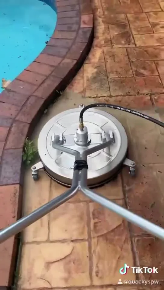 Surface cleaner working a pool surround