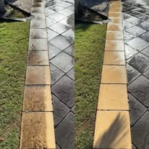 A Gold Coast paver path, left side still mossy and grimy, right side cleaned in a single pass