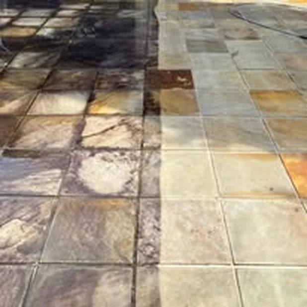 Sandstone-look tiles, grimy on the left, restored on the right